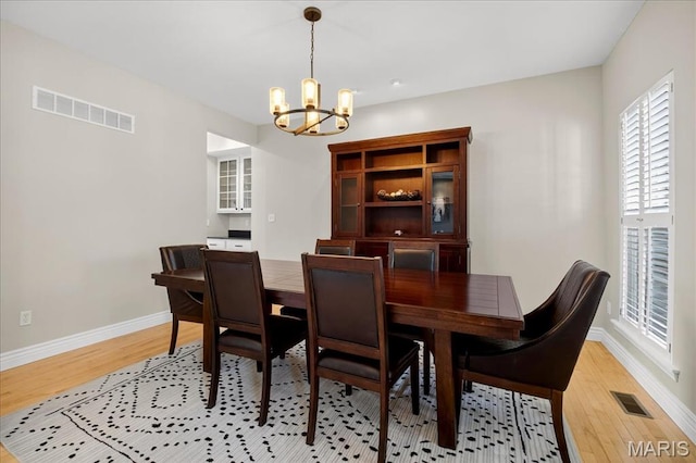 612 Thornridge Dr, Ofallon, MO 63368 - dining area featuring a chandelier, light wood-style floors, and recessed lighting