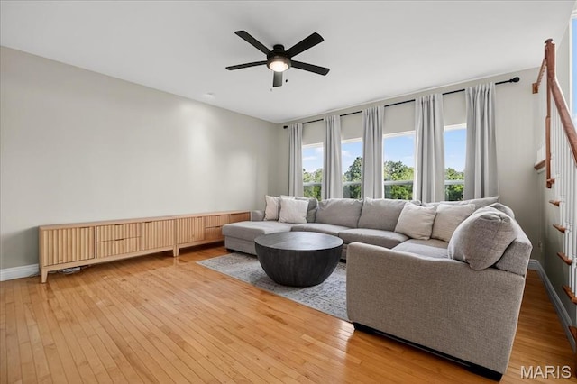 612 Thornridge Dr, Ofallon, MO 63368 - living room featuring ceiling fan, radiator, and wood-type flooring