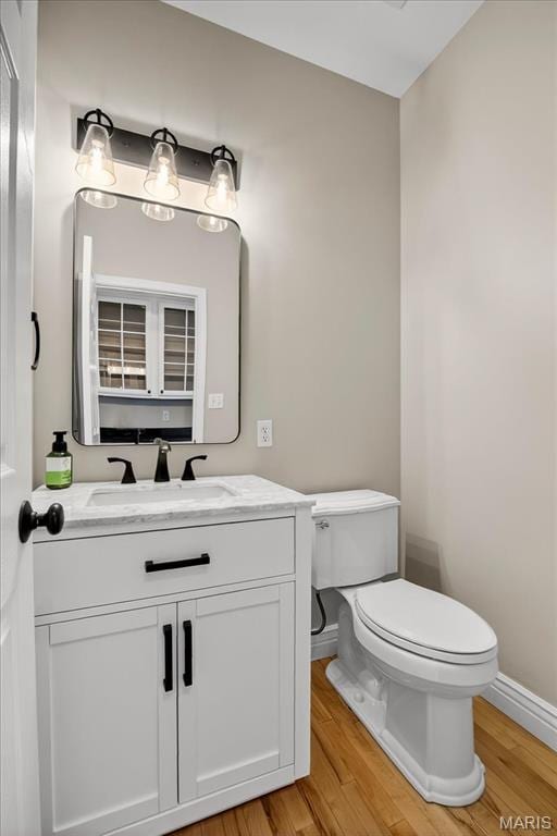 612 Thornridge Dr, Ofallon, MO 63368 - bathroom with wood finished floors and vanity