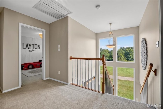 612 Thornridge Dr, Ofallon, MO 63368 - hallway featuring an upstairs landing and carpet
