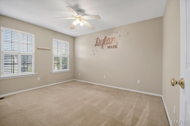 612 Thornridge Dr, Ofallon, MO 63368 - spare room with carpet and a ceiling fan