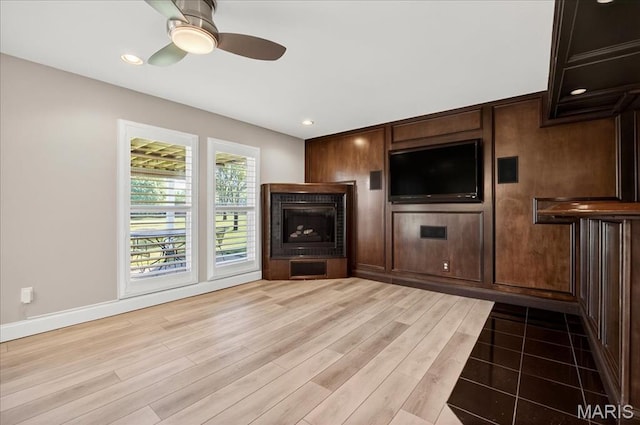 612 Thornridge Dr, Ofallon, MO 63368 - unfurnished living room featuring a ceiling fan, light wood finished floors, and recessed lighting