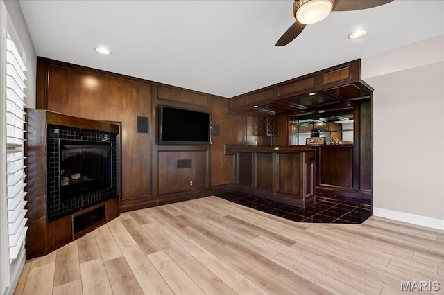 612 Thornridge Dr, Ofallon, MO 63368 - bar with ceiling fan, wood finished floors, a fireplace, and recessed lighting