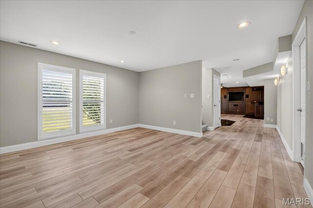 612 Thornridge Dr, Ofallon, MO 63368 - unfurnished room featuring light wood-type flooring and recessed lighting