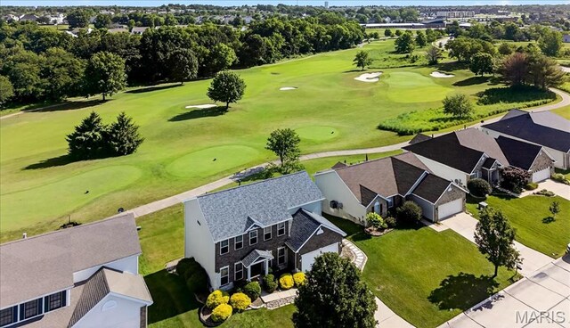 612 Thornridge Dr, Ofallon, MO 63368 - bird's eye view of a golf course and a tree filled landscape