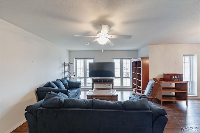 917 Claytonbrook Dr Unit 3, Ballwin, MO 63011 - living room with ceiling fan, dark wood-style floors, and a textured ceiling