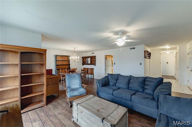 917 Claytonbrook Dr Unit 3, Ballwin, MO 63011 - living area with a chandelier, a ceiling fan, and wood finished floors