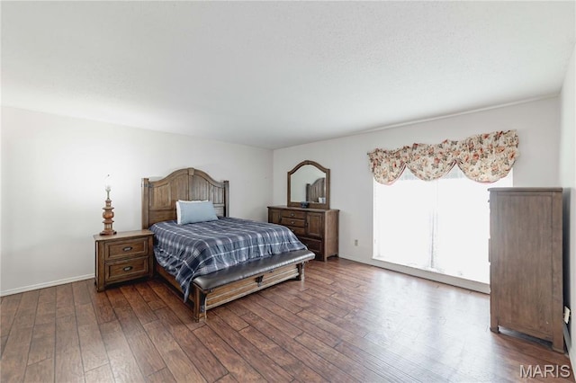 917 Claytonbrook Dr Unit 3, Ballwin, MO 63011 - bedroom featuring dark wood-style flooring and baseboards