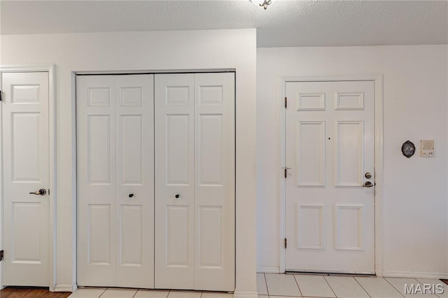 917 Claytonbrook Dr Unit 3, Ballwin, MO 63011 - interior space featuring baseboards and light tile patterned flooring