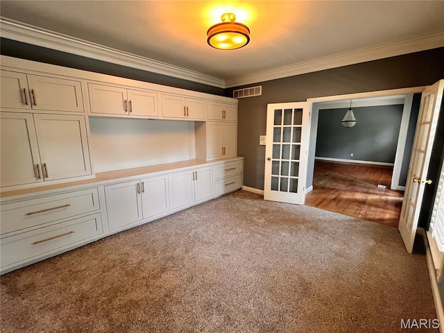 114 Cloverleaf Meadows Ct, Ofallon, MO 63366 - carpeted spare room with crown molding and french doors