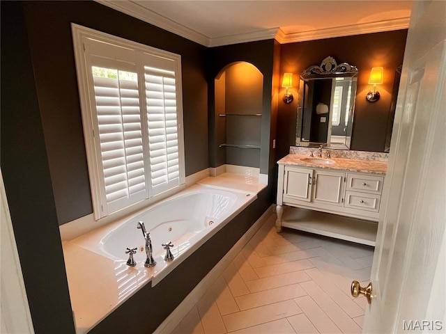 114 Cloverleaf Meadows Ct, Ofallon, MO 63366 - bathroom featuring a tub with jets, vanity, crown molding, and tile patterned flooring