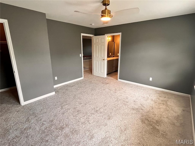 114 Cloverleaf Meadows Ct, Ofallon, MO 63366 - unfurnished bedroom with carpet floors, ensuite bath, a walk in closet, and ceiling fan