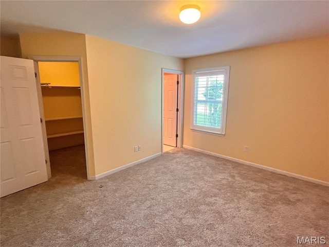 114 Cloverleaf Meadows Ct, Ofallon, MO 63366 - unfurnished bedroom with a spacious closet, carpet flooring, and a closet