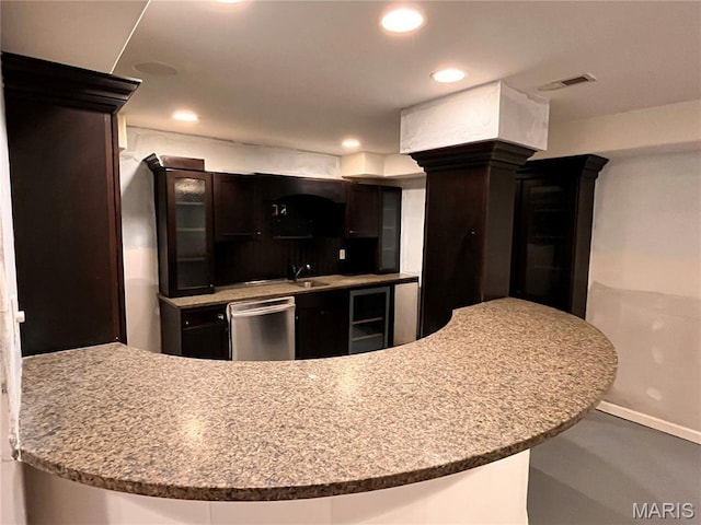 114 Cloverleaf Meadows Ct, Ofallon, MO 63366 - kitchen with dishwasher, recessed lighting, glass insert cabinets, and wine cooler