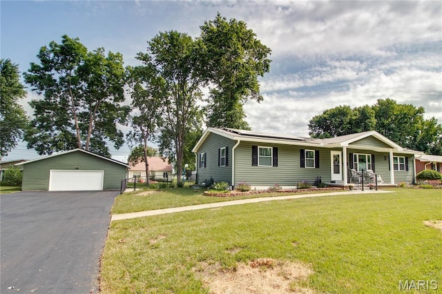 109 Hawbrook Pl, Jerseyville, IL 62052 - ranch-style home with a detached garage, an outbuilding, and covered porch