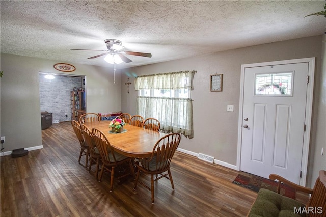 109 Hawbrook Pl, Jerseyville, IL 62052 - dining area featuring wood finished floors, a ceiling fan, healthy amount of natural light, and a textured ceiling