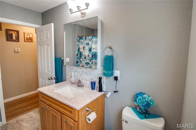 109 Hawbrook Pl, Jerseyville, IL 62052 - bathroom with vanity, decorative backsplash, a shower with curtain, and a textured ceiling