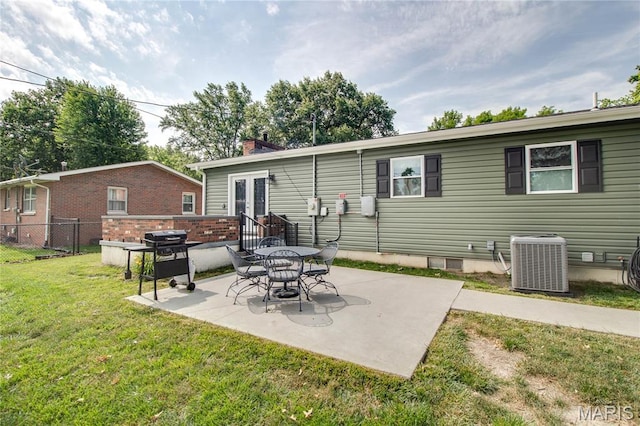 109 Hawbrook Pl, Jerseyville, IL 62052 - rear view of house with a patio, a chimney, and french doors