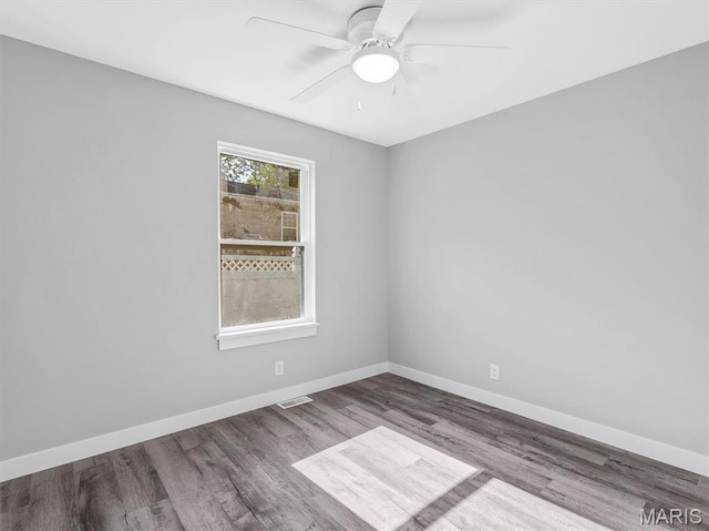 1505 Cypress Dr, Pacific, MO 63069 - spare room with wood finished floors and ceiling fan