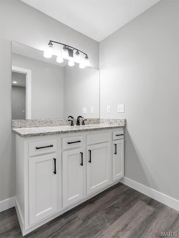 1505 Cypress Dr, Pacific, MO 63069 - bathroom with vanity and wood finished floors