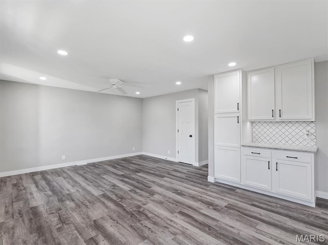 1505 Cypress Dr, Pacific, MO 63069 - basement with ceiling fan, wood finished floors, and recessed lighting