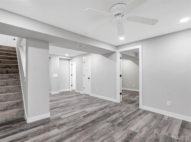 1505 Cypress Dr, Pacific, MO 63069 - finished basement featuring wood finished floors, recessed lighting, stairs, and a ceiling fan