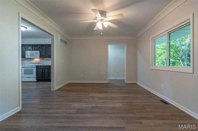 525 Oak Hill Dr, Lake St Louis, MO 63367 - spare room with a ceiling fan, ornamental molding, and dark wood-style flooring