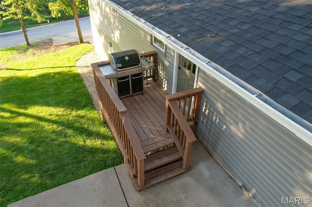 525 Oak Hill Dr, Lake St Louis, MO 63367 - wooden deck featuring area for grilling and a lawn