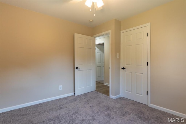 525 Oak Hill Dr, Lake St Louis, MO 63367 - unfurnished bedroom with carpet and a ceiling fan