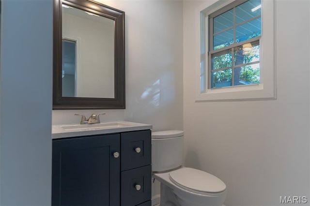 525 Oak Hill Dr, Lake St Louis, MO 63367 - half bathroom featuring toilet and vanity