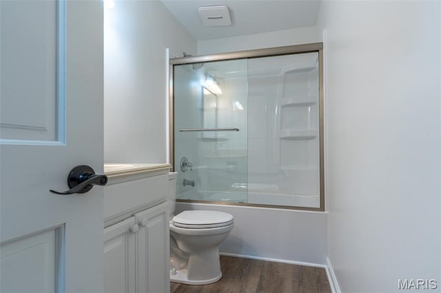 525 Oak Hill Dr, Lake St Louis, MO 63367 - full bath featuring wood finished floors, combined bath / shower with glass door, and vanity