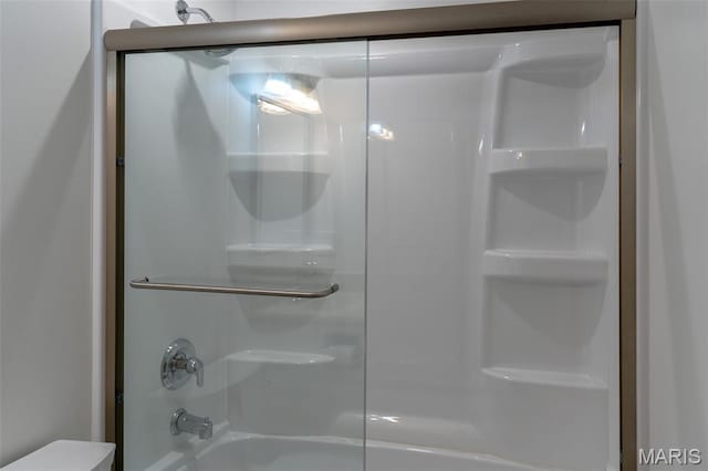 525 Oak Hill Dr, Lake St Louis, MO 63367 - bathroom with toilet and bathing tub / shower combination
