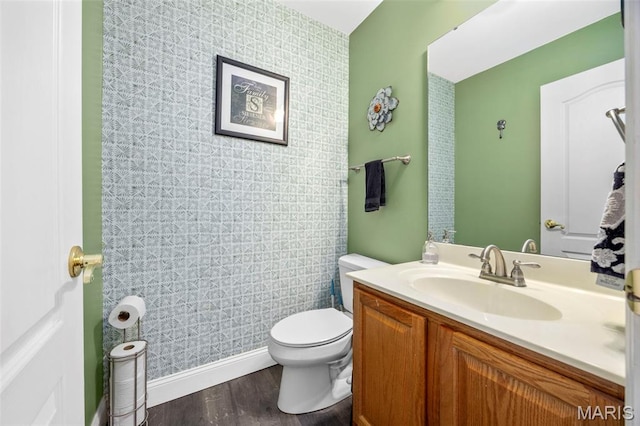 105 Royallmanor Ln, Ofallon, MO 63368 - bathroom featuring vanity, wood finished floors, and an accent wall