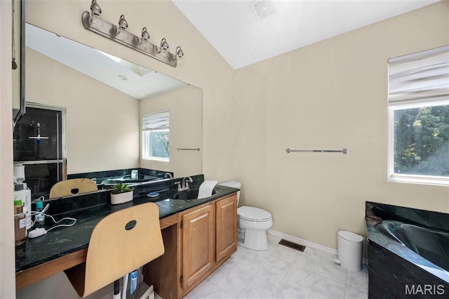 105 Royallmanor Ln, Ofallon, MO 63368 - bathroom with vaulted ceiling, a bath, healthy amount of natural light, marble finish flooring, and vanity