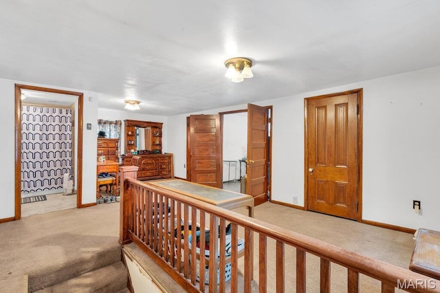 5447 Claxton Ave, Saint Louis, MO 63120 - hallway featuring light colored carpet and baseboards