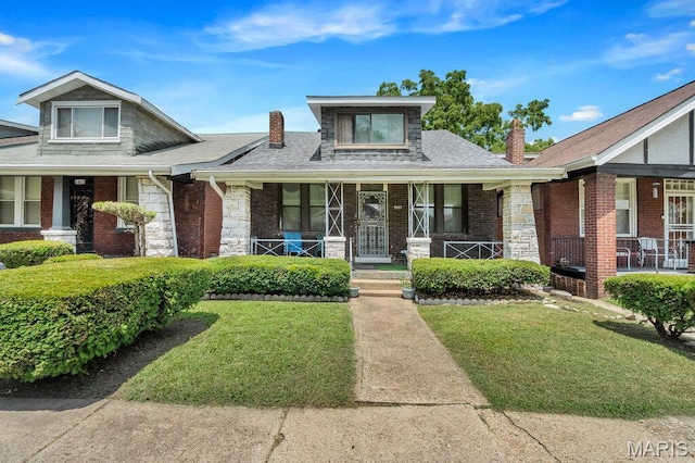 5447 Claxton Ave, Saint Louis, MO 63120 - view of front facade with a chimney, covered porch, and a front lawn