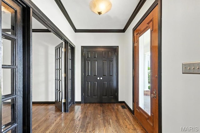 512 Overlook Terrace Ct, Eureka, MO 63025 - entrance foyer featuring dark wood-style flooring and crown molding
