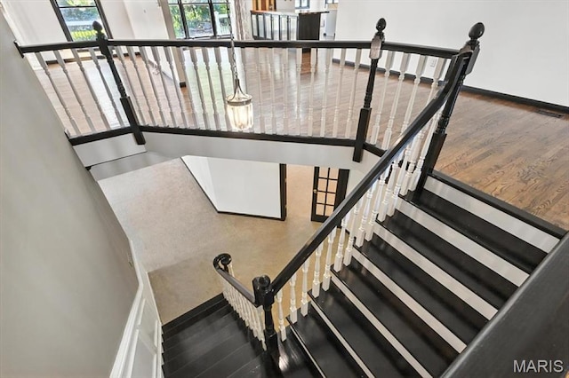 512 Overlook Terrace Ct, Eureka, MO 63025 - stairs featuring wood finished floors and a high ceiling