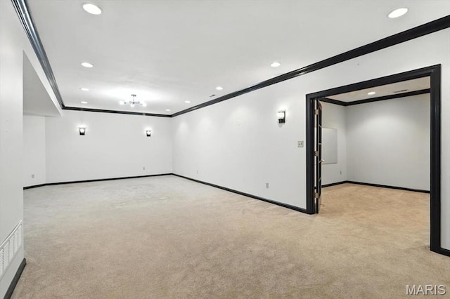 512 Overlook Terrace Ct, Eureka, MO 63025 - spare room with crown molding, recessed lighting, and light colored carpet