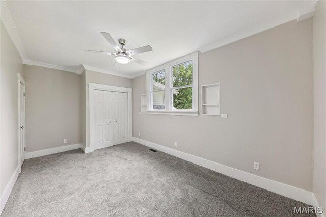 413 E Beach St, Litchfield, IL 62056 - unfurnished bedroom with carpet flooring, ornamental molding, a closet, and ceiling fan