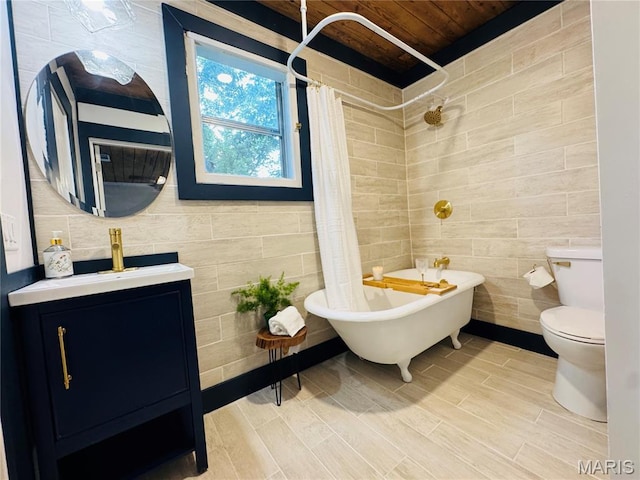 719 N 10th St, Poplar Bluff, MO 63901 - bathroom featuring tile walls, vanity, wood ceiling, wood finished floors, and a combined bath / shower with freestanding tub