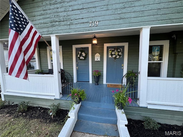 719 N 10th St, Poplar Bluff, MO 63901 - entrance to property featuring covered porch