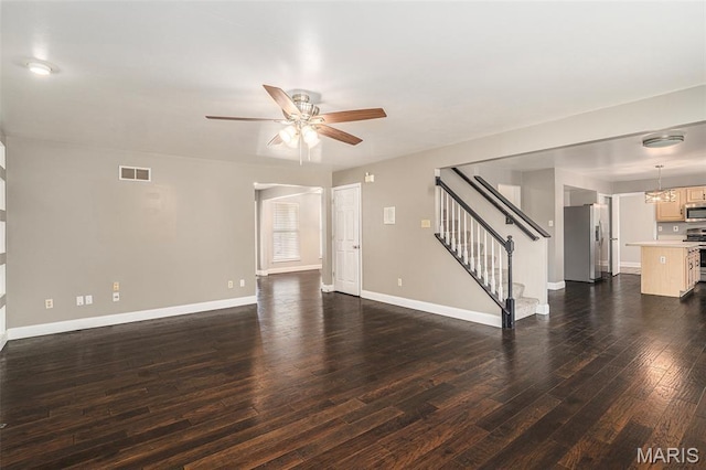 1016 Scenic Oaks Ct, Imperial, MO 63052 - unfurnished living room with stairs, wood finished floors, and ceiling fan