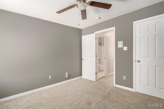 1016 Scenic Oaks Ct, Imperial, MO 63052 - unfurnished bedroom featuring light carpet, ceiling fan, and ensuite bathroom