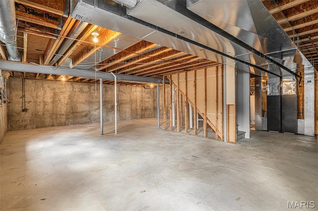 1016 Scenic Oaks Ct, Imperial, MO 63052 - unfinished below grade area featuring heating unit and stairway