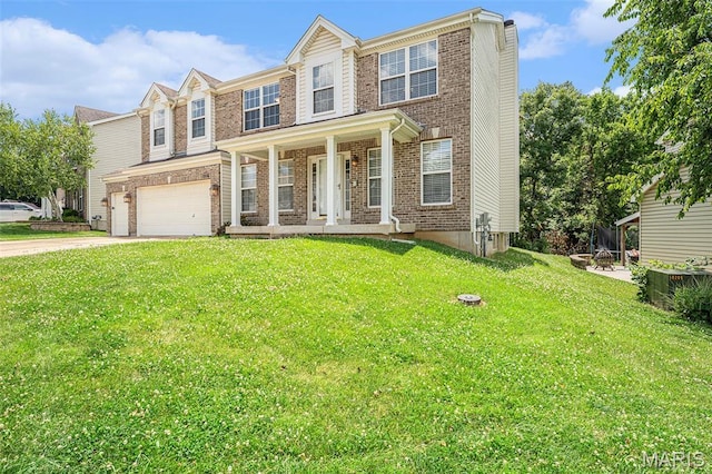 1016 Scenic Oaks Ct, Imperial, MO 63052 - view of front of house featuring an attached garage, covered porch, driveway, brick siding, and a front lawn