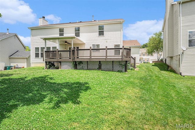 1016 Scenic Oaks Ct, Imperial, MO 63052 - rear view of house with a wooden deck, a yard, a chimney, and a ceiling fan