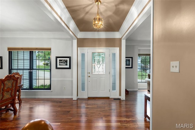 2260 Crimson View Dr, Wildwood, MO 63011 - foyer featuring a chandelier, healthy amount of natural light, wood finished floors, and crown molding
