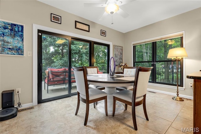 2260 Crimson View Dr, Wildwood, MO 63011 - dining room featuring ceiling fan and light tile patterned flooring