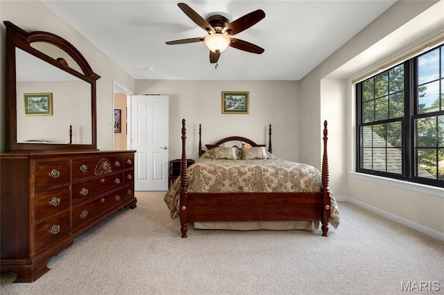 2260 Crimson View Dr, Wildwood, MO 63011 - bedroom with light colored carpet and a ceiling fan